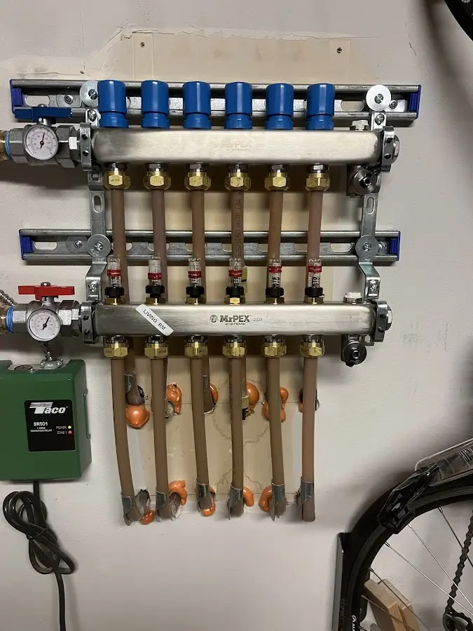 Plumber performing Leak Detection at a residential property in Erie